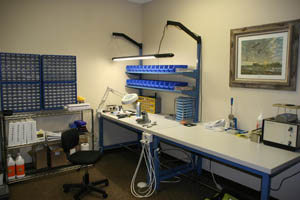 One of the repair tables at The Dental Handpiece Repair Guy